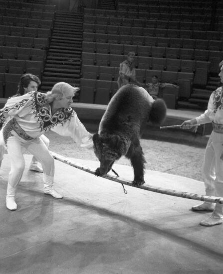 Artist Viktor Shempur with trained bear