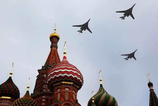 Military aircraft fly over Red Square