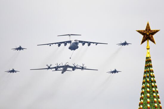 Military aircraft fly over Red Square