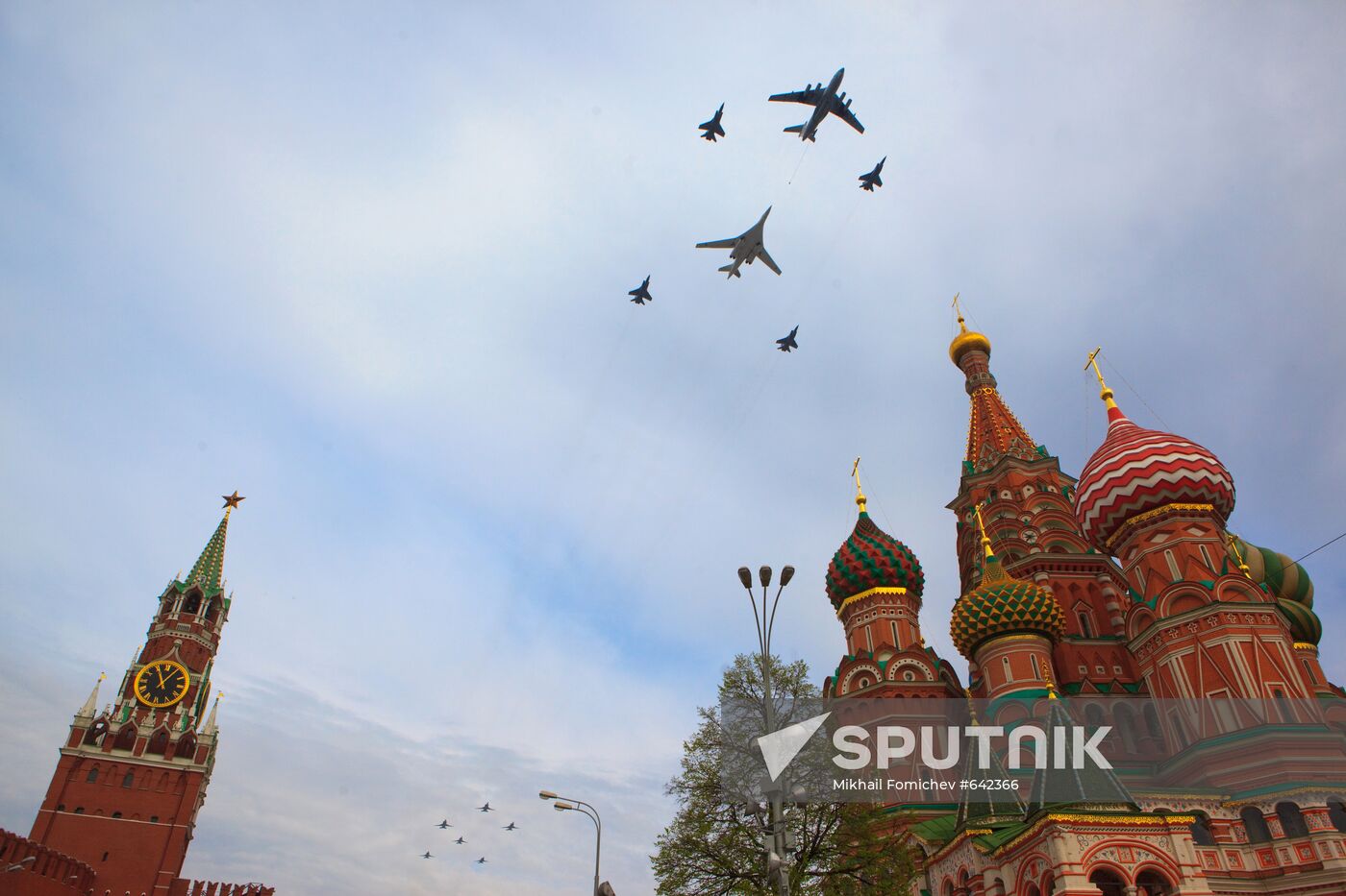 Military aircraft fly over Red Square