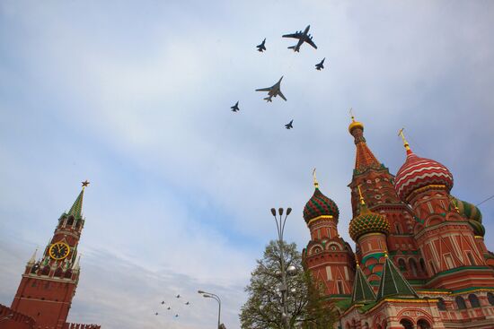 Military aircraft fly over Red Square