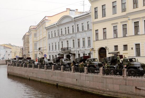 Military weaponry on the Moika River embankment