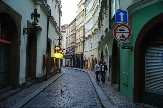 Couple on a street of Prague Old Town