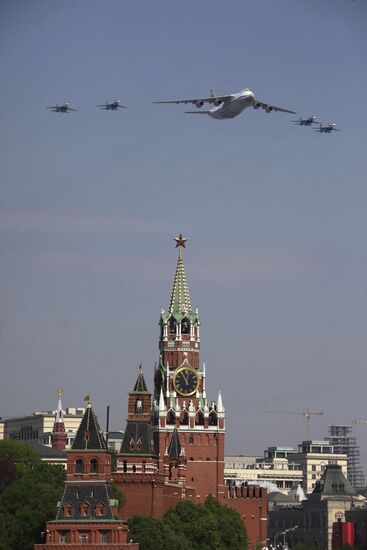 Military aircraft fly over Red Square