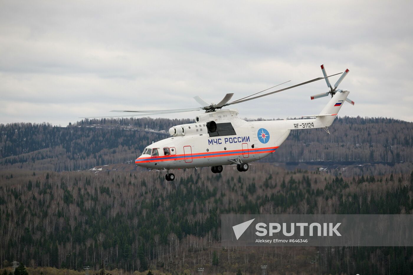 EMERCOM helicopter at the site of blasts at the Raspadskaya coal
