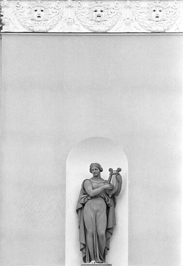 Sculpture of a Muse in niche