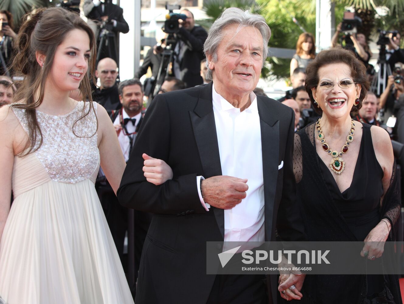 Claudia Cardinale and Alain Delon with his daughter Anouschka