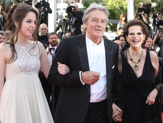 Claudia Cardinale and Alain Delon with his daughter Anouschka