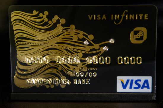 Visa Infinite credit card encrusted with three diamonds