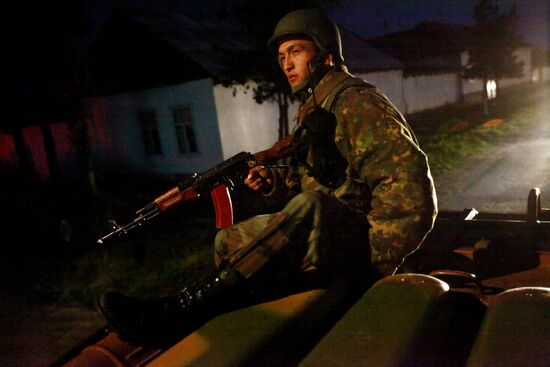 Soldiers patrolling Jalal-Abad streets