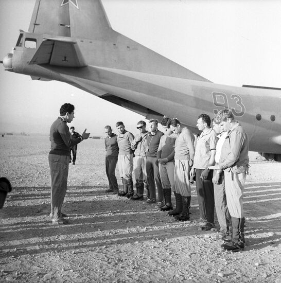 Mountaineers and paratroopers on airfield
