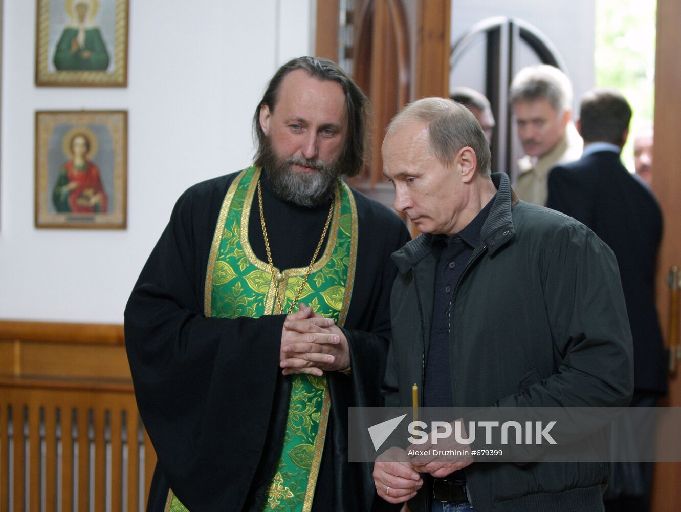 Vladimir Putin attends church in Nevskaya Dubrovka