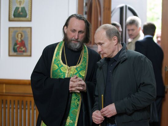 Vladimir Putin attends church in Nevskaya Dubrovka
