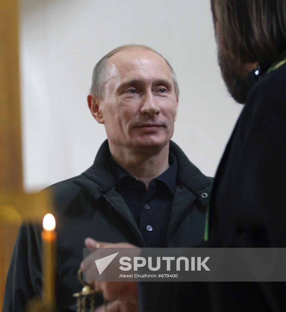 Vladimir Putin attends church in Nevskaya Dubrovka