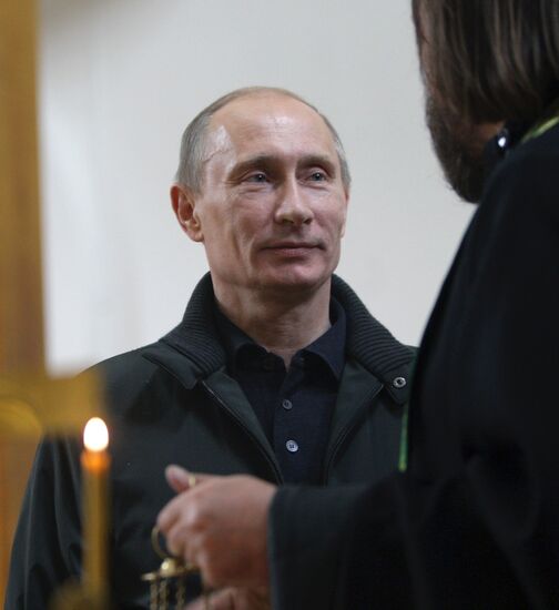 Vladimir Putin attends church in Nevskaya Dubrovka