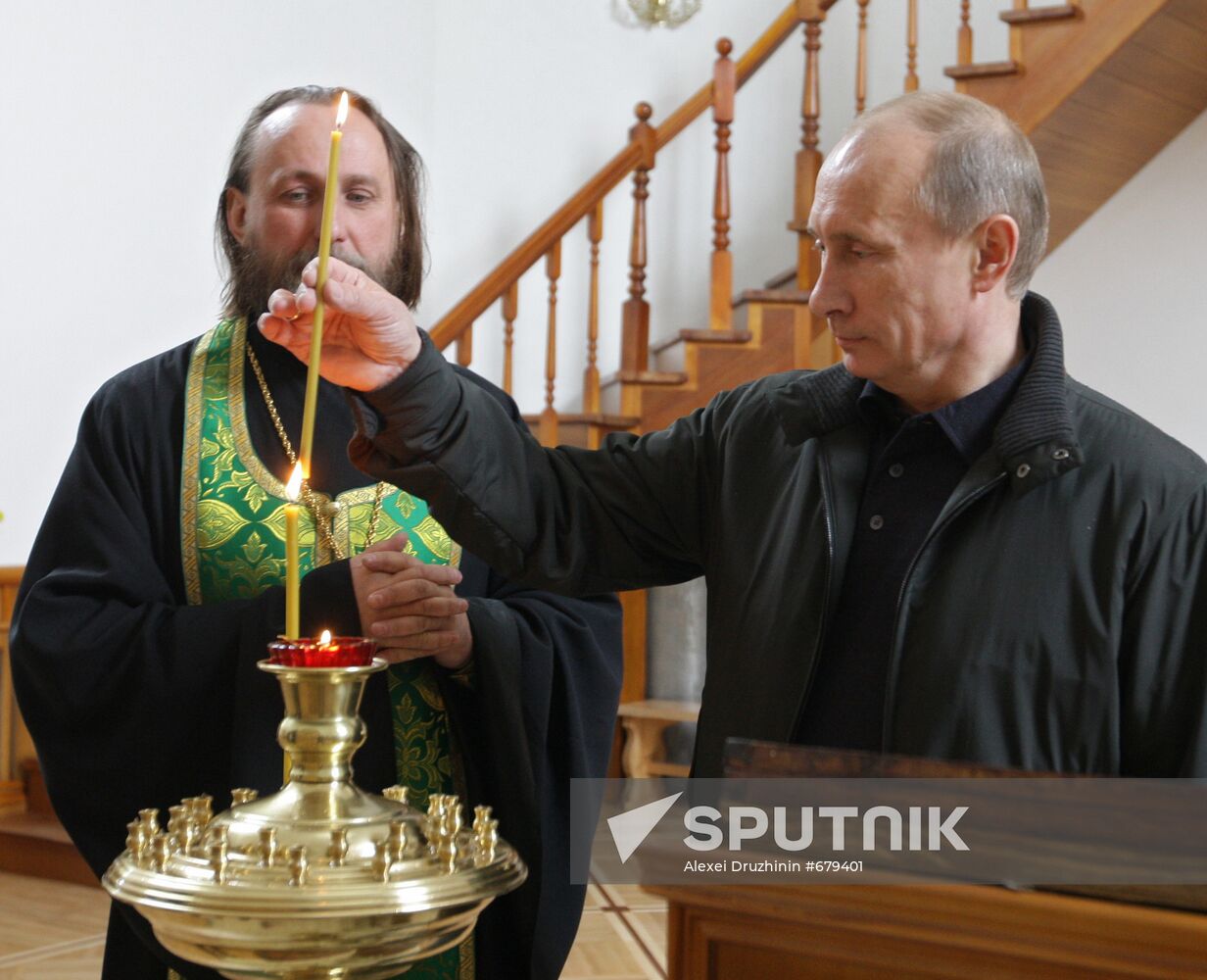 Vladimir Putin attends church in Nevskaya Dubrovka