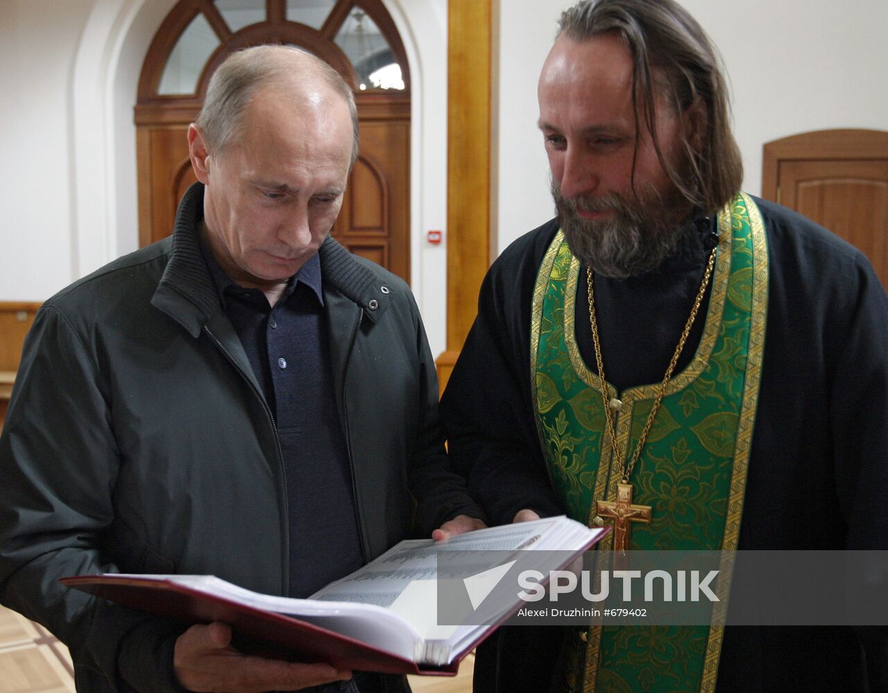 Vladimir Putin attends church in Nevskaya Dubrovka