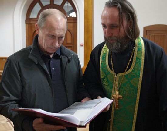 Vladimir Putin attends church in Nevskaya Dubrovka