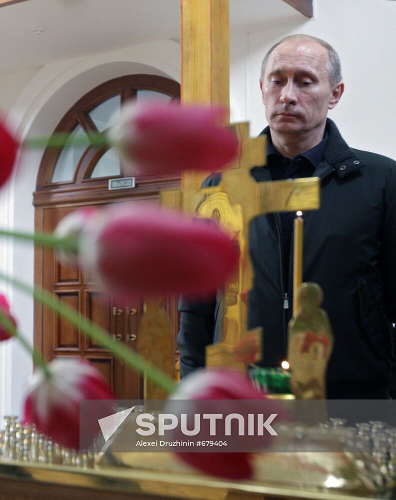 Vladimir Putin attends church in Nevskaya Dubrovka