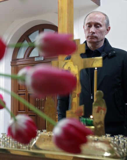 Vladimir Putin attends church in Nevskaya Dubrovka