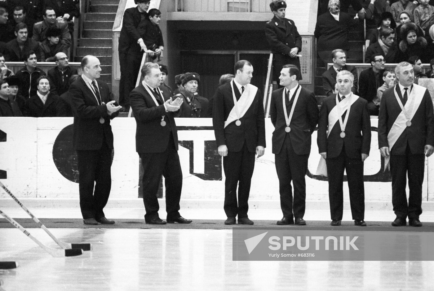 Coaches are awarded commemorative medal