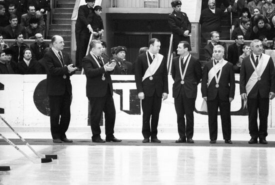Coaches are awarded commemorative medal