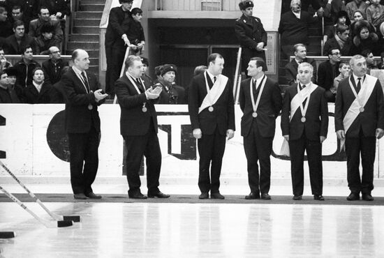 Coaches are awarded commemorative medal