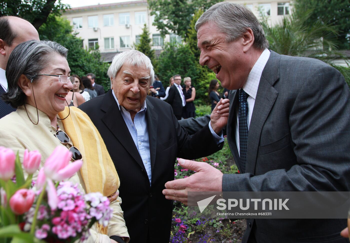 Yury Lyubimov with his wife Katalina and Pavel Borodin