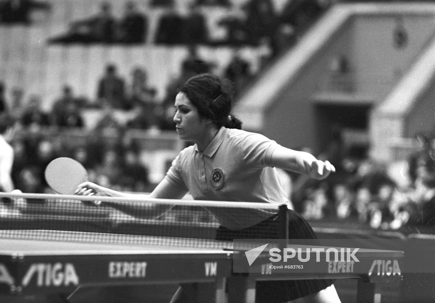 Tennis player Rita Pogosova during match