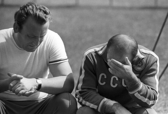 Coach N.N. Parkhomenko and wrestler R.V. Rurua