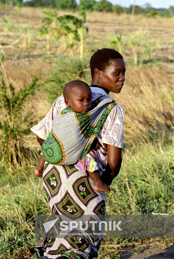 Resident of Tanzania with her baby