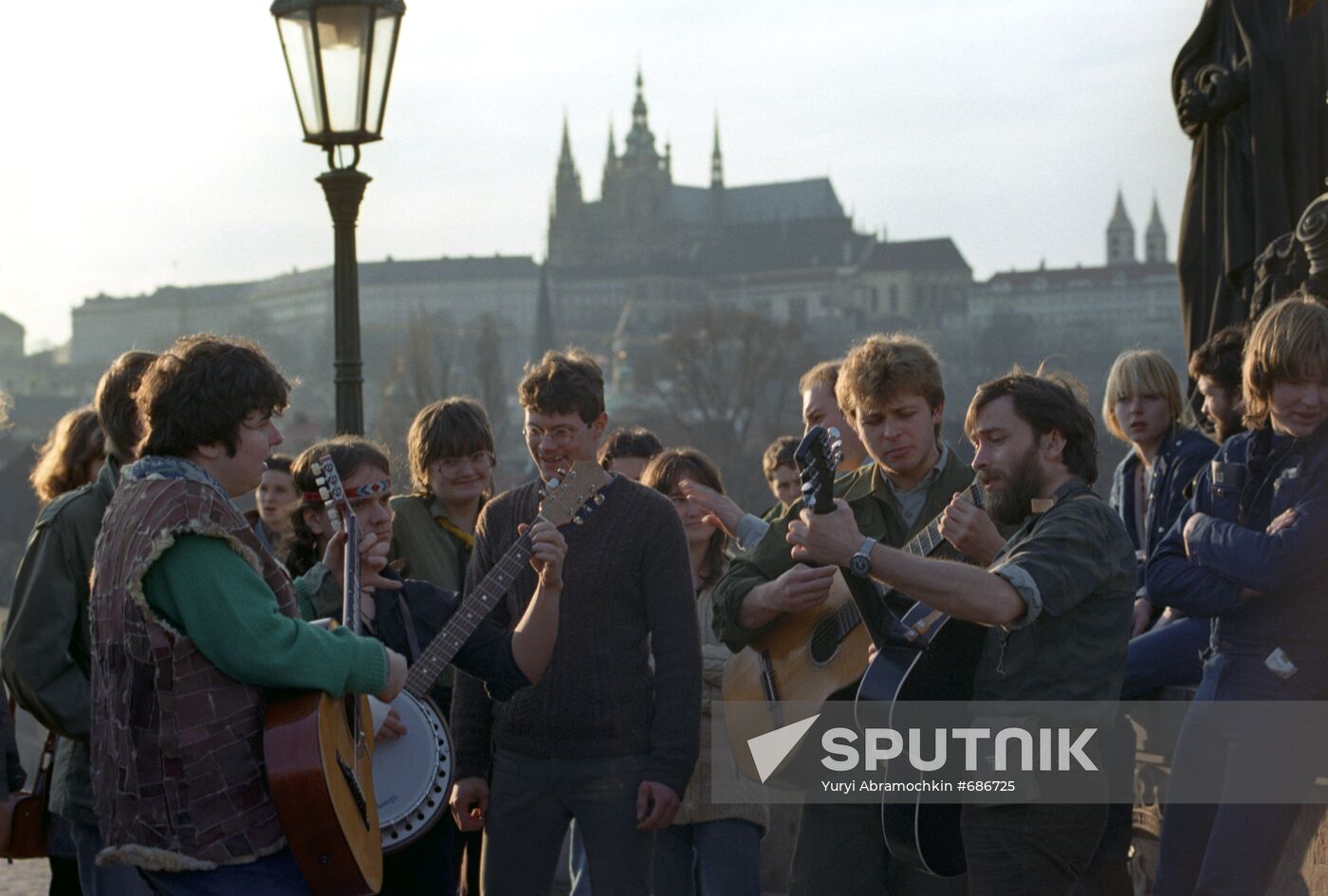 Young people at Charles Bridge in Prague