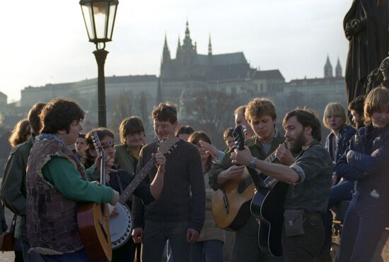 Young people at Charles Bridge in Prague