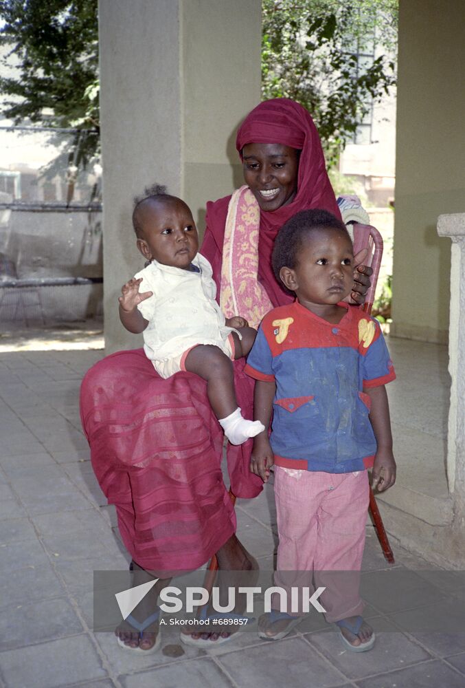 Young Sudanese with her kids