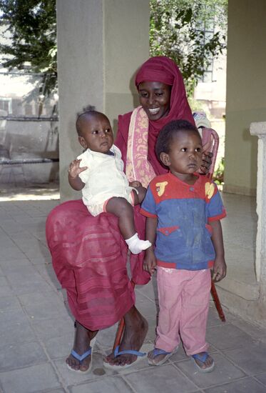 Young Sudanese with her kids