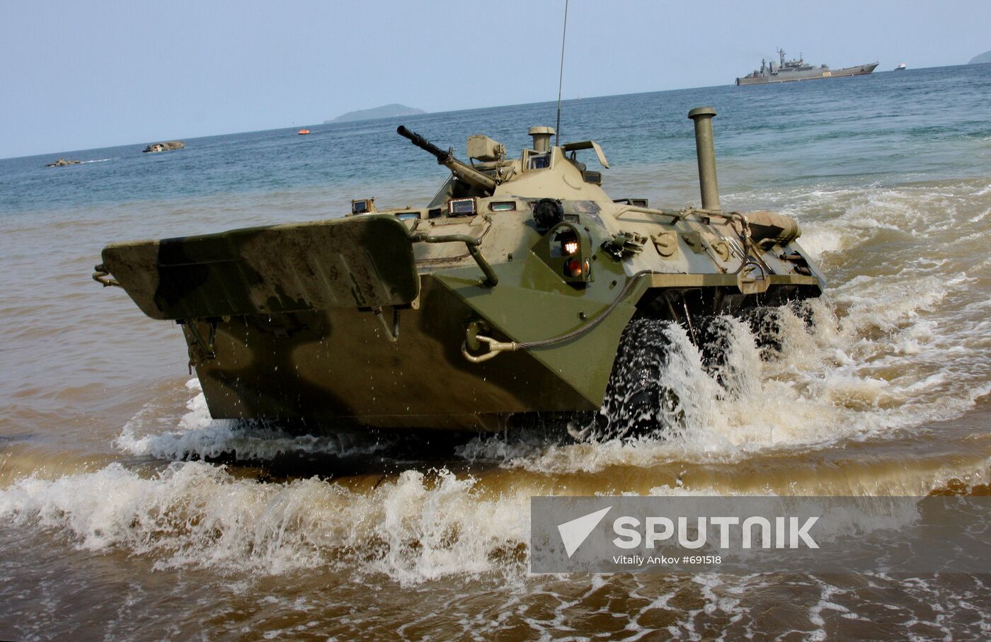 Armed Personnel Carrier goes to ashore.