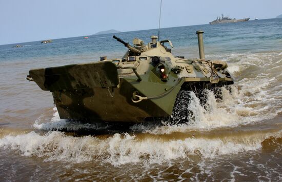 Armed Personnel Carrier goes to ashore.