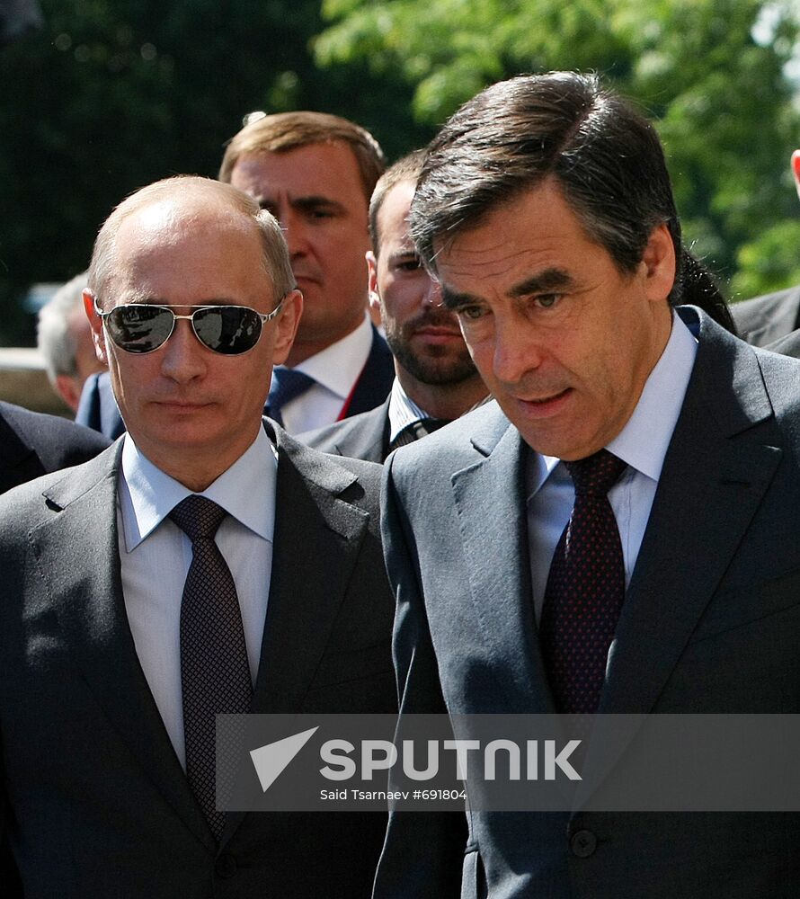 French, Russian PMs take walk in Paris