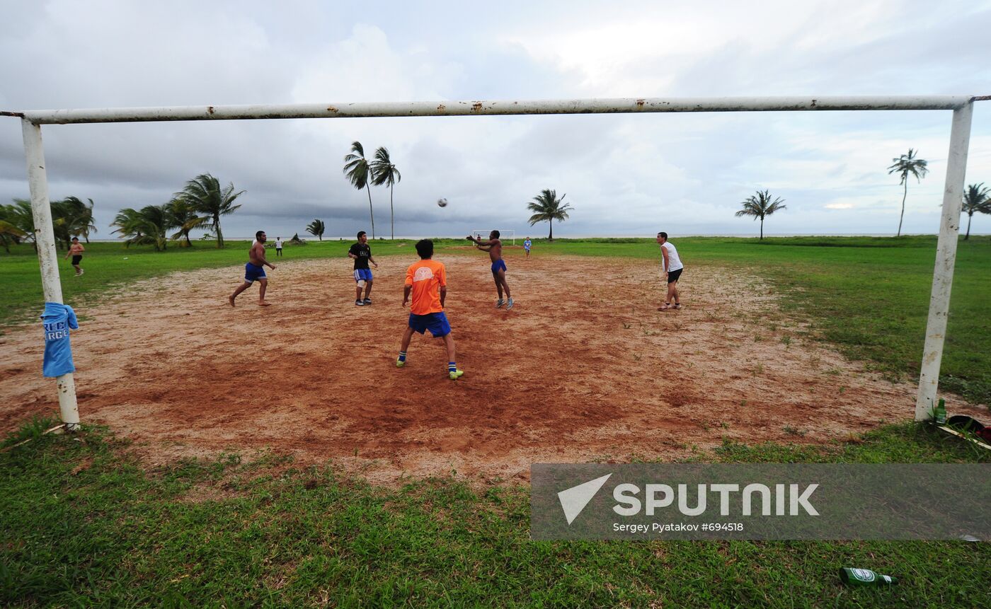 Citizens of Kourou playing football