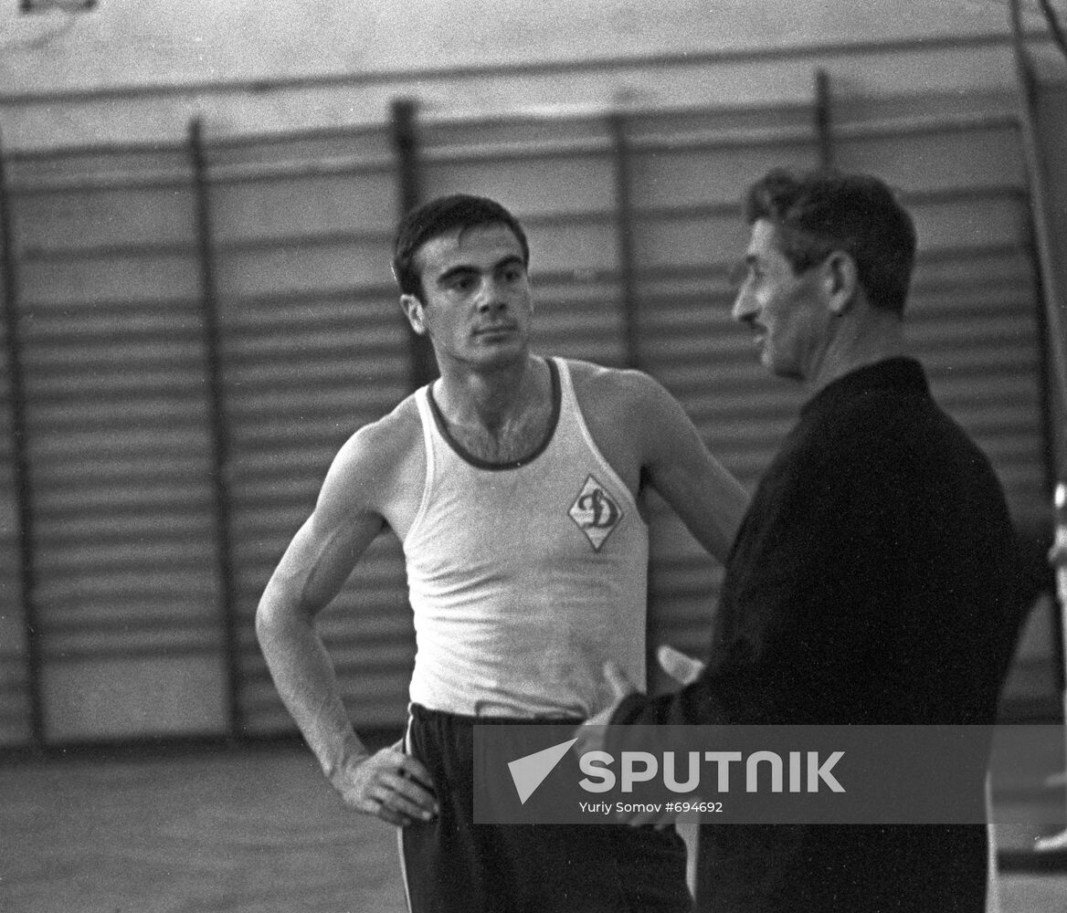 Athlete Viktor Saneev with his coach Akop Kerselyan