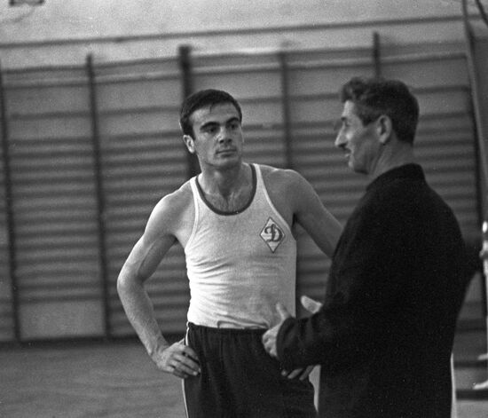 Athlete Viktor Saneev with his coach Akop Kerselyan