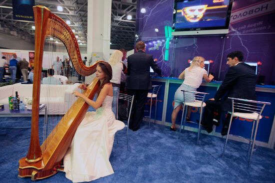 Visitors attend Russian Gaming Week exhibition