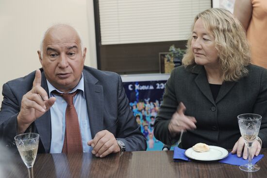 Mikhail Davydov and Carol Greider