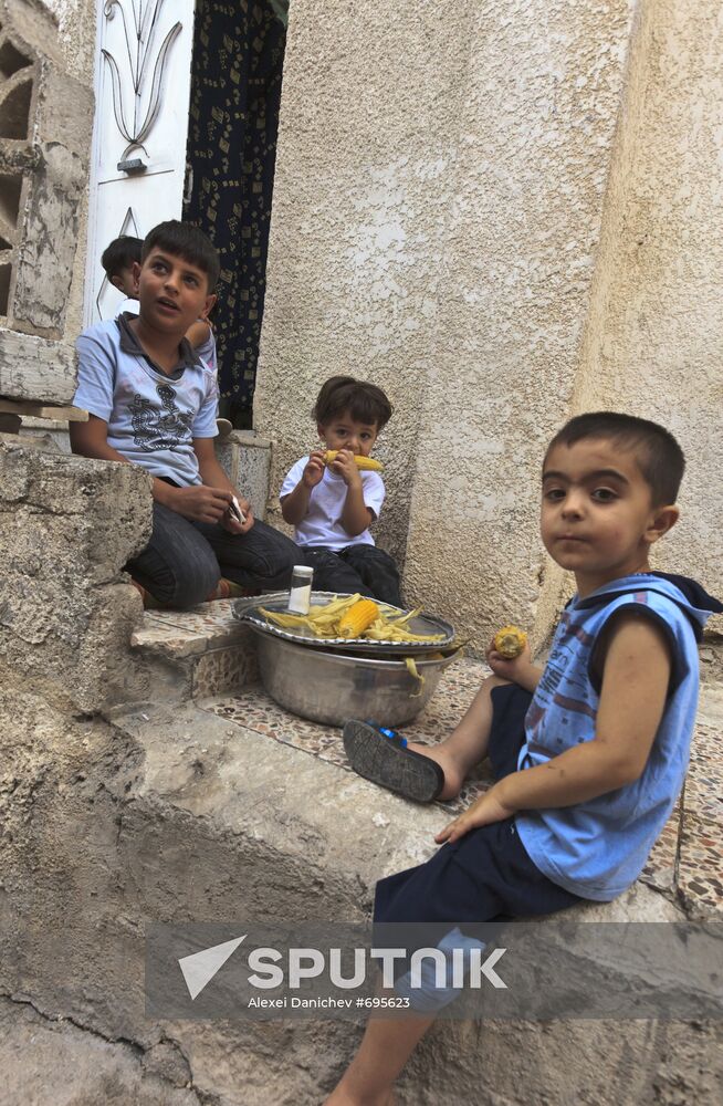 Children in a poor district of Damascus. Location: Syria, . Author: Alexei Danichev/Sputnik. Children