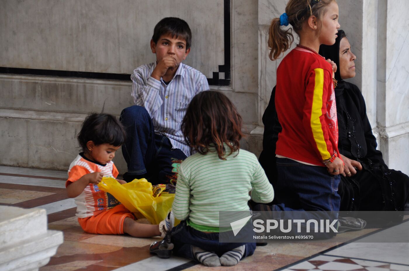 Believers in the Central Mosque of Damascus. Location: Syria, . Author: Natalia Seliverstova/Sputnik. Believers