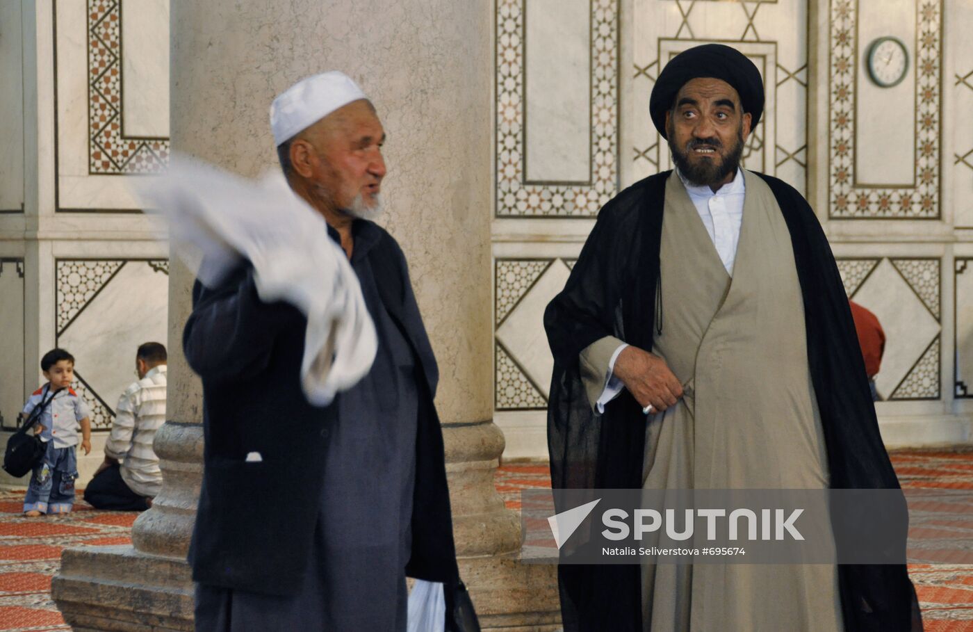 Believers in the Central Mosque of Damascus. Location: Syria, . Author: Natalia Seliverstova/Sputnik. Believers