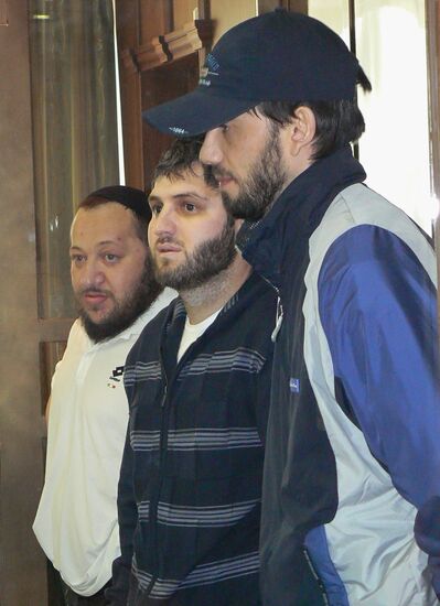 Criminal defendants attend court hearings