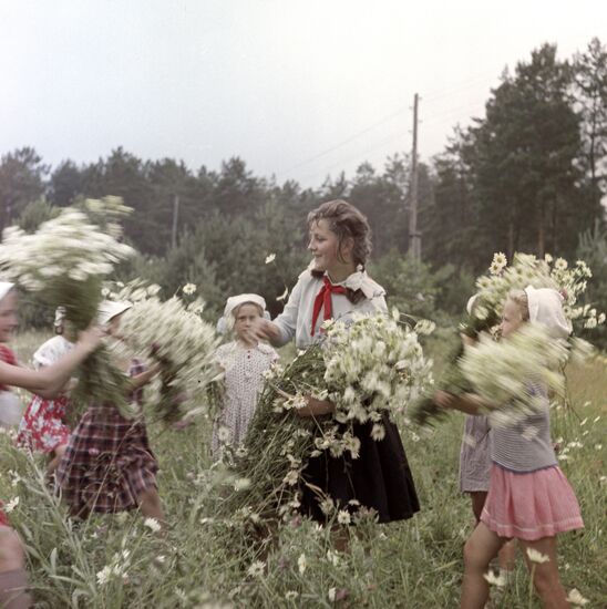 Children and their Young Pioneer leader