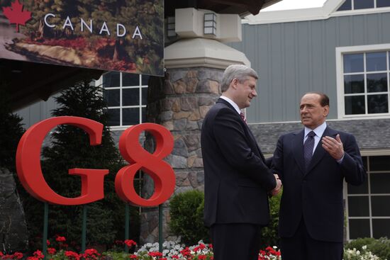 Silvio Berlusconi and Stephen Harper