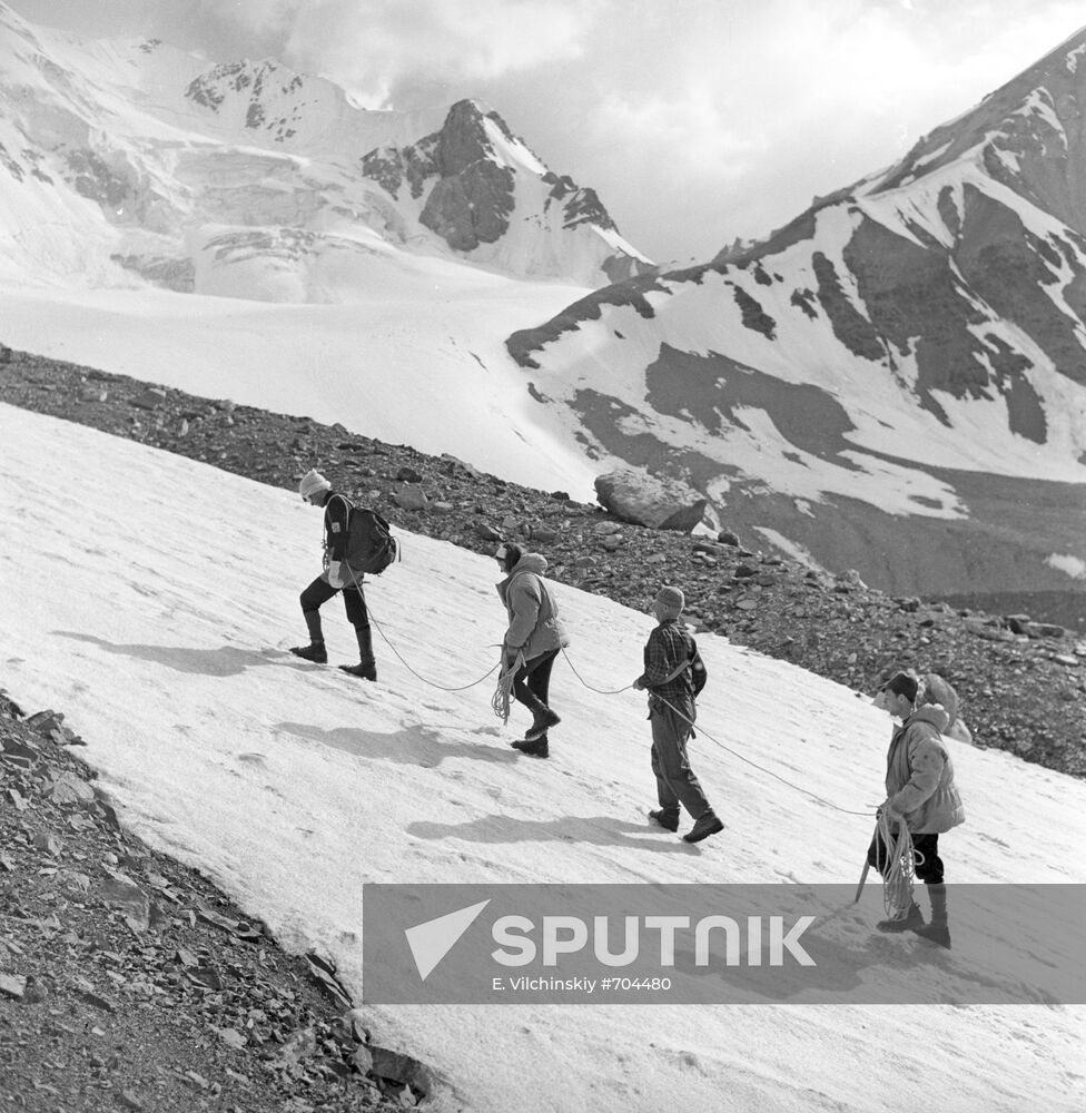 Soviet mountain climbers at the foot of the Lenin Peak